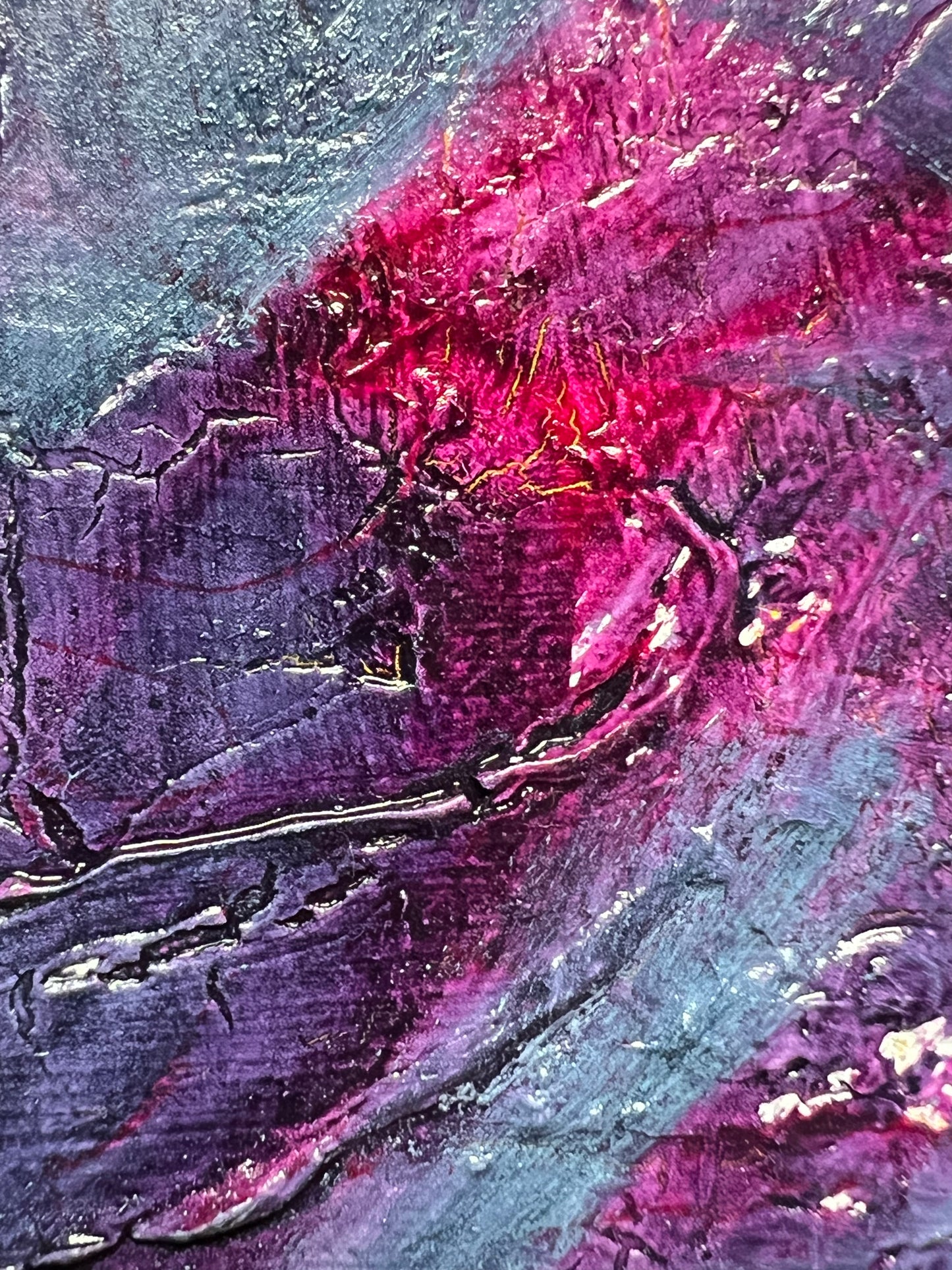 Veil of the Unknown is an oil and acrylic Ink painting by Beatrice Morel. A mesmerizing abstract work that evokes the sensation of drifting through an unseen realm. The interplay of deep greens, midnight blues, and rich magentas creates an atmosphere both mysterious and ethereal, as if the canvas itself is breathing with an unspoken energy. Showing a close up.