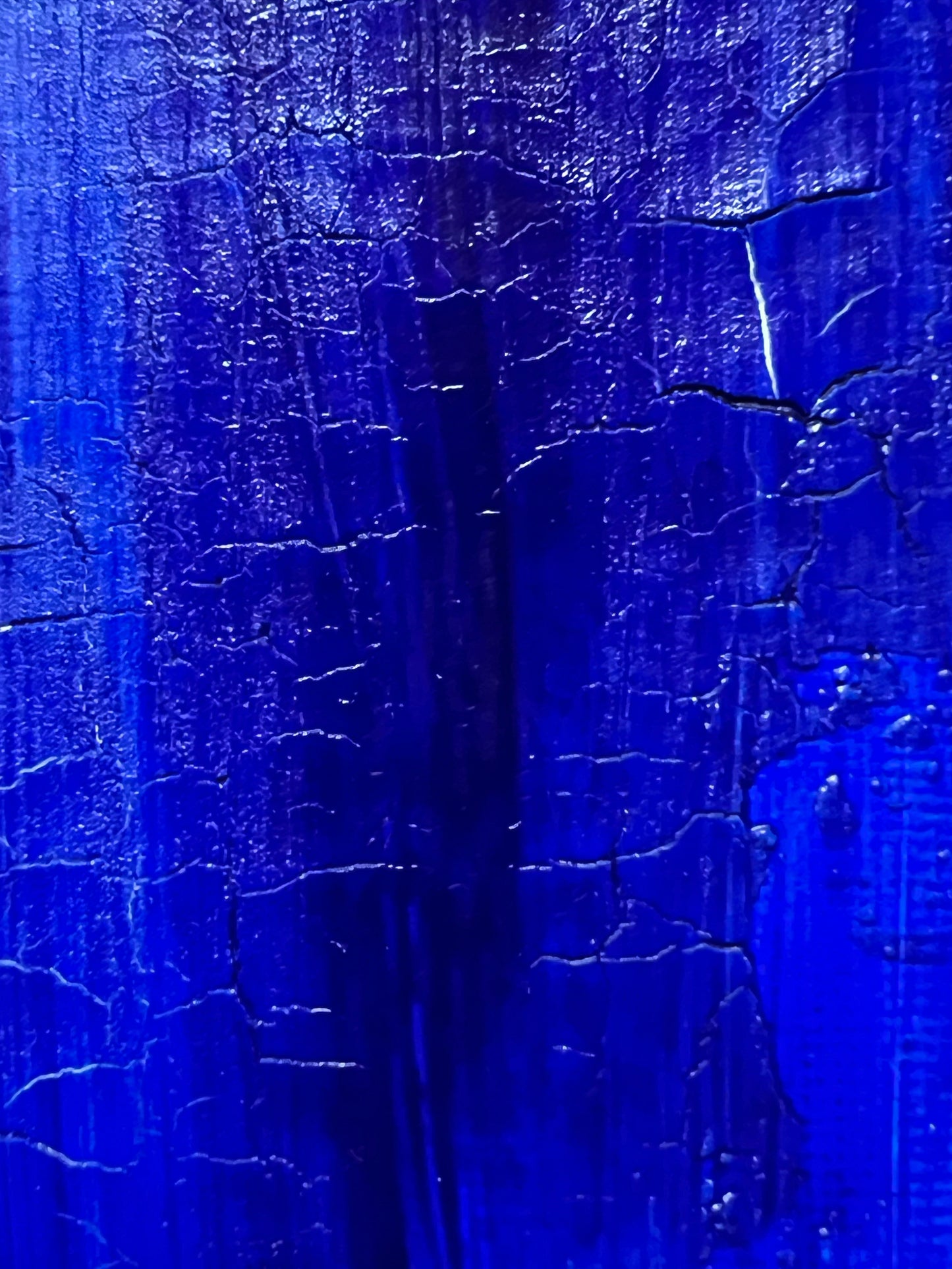 Fractured Echoes, is an oil and acrylic Ink abstract painting by Beatrice Morel. This painting is a hauntingly beautiful exploration of time, memory, and transformation. Featuring deep, moody blues that dominate the canvas, creating an almost infinite expanse that feels like the depths of the ocean or the vastness of a twilight sky. Against this backdrop, fiery reds and earthy browns emerge, their forms fractured and disrupted, as if something once whole has begun to break apart and decay.