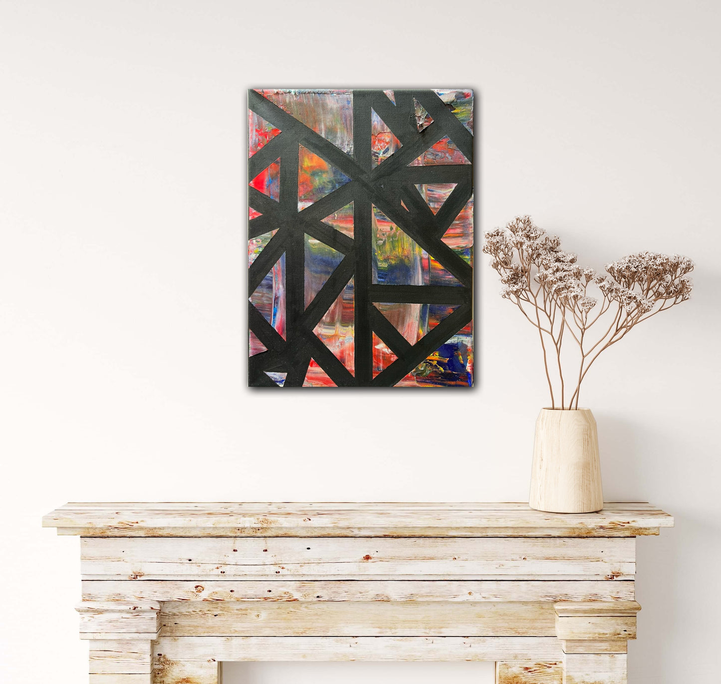 Gentle Soul, an oil and posca pen based abstract painting by Beatrice Morel, above a fireplace, featuring rich reds, calming blues, sunny yellows and soft pinks.